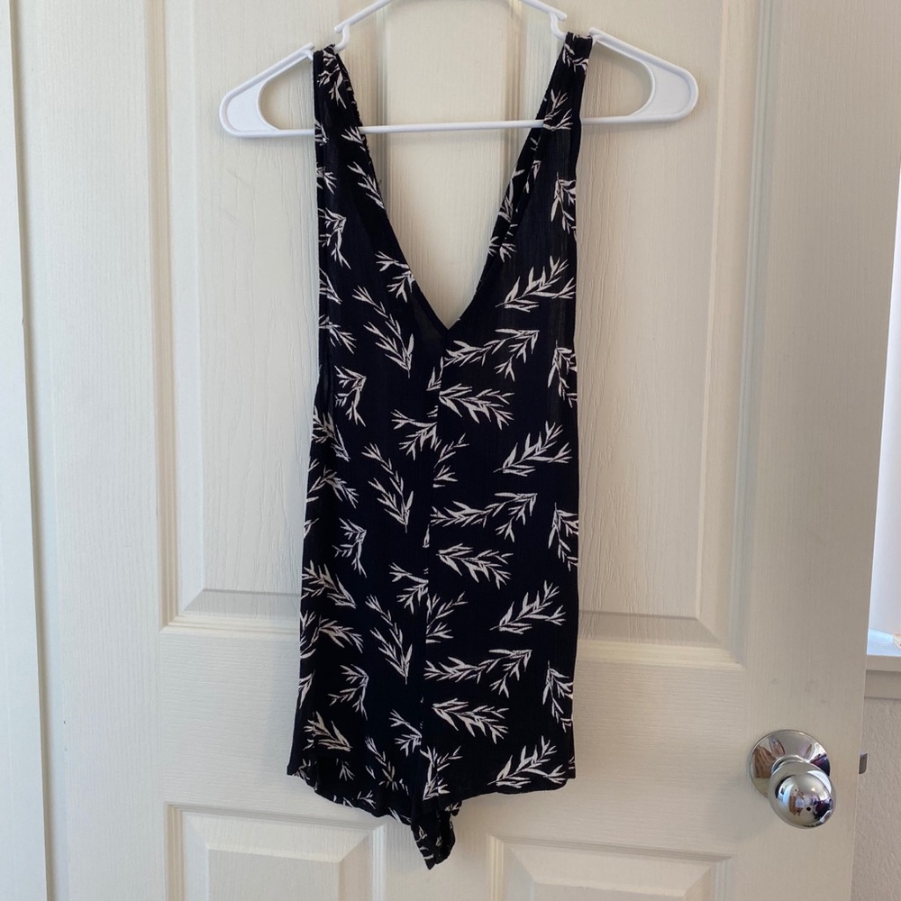 Out from under black romper/coverup